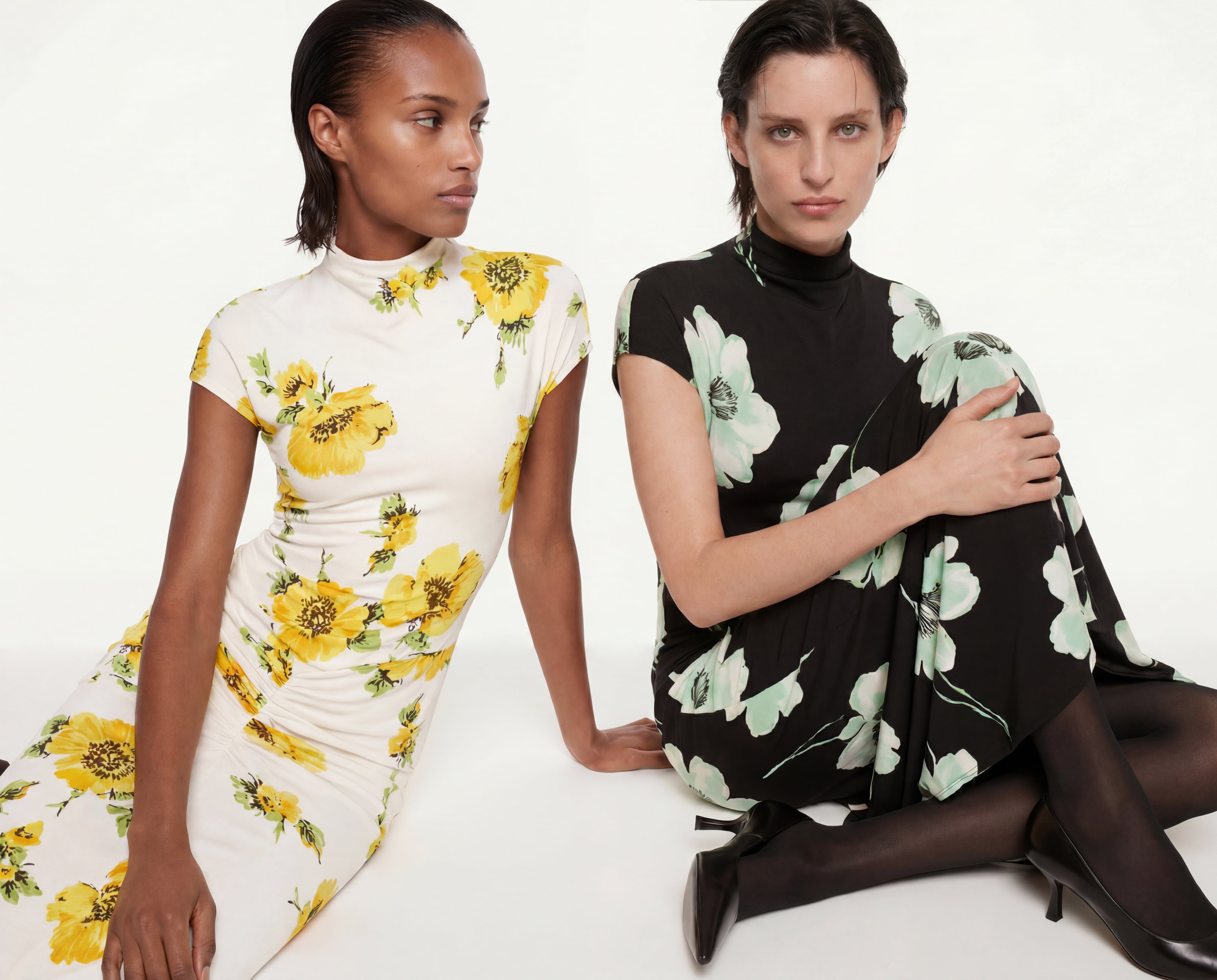 Two models in floral dresses